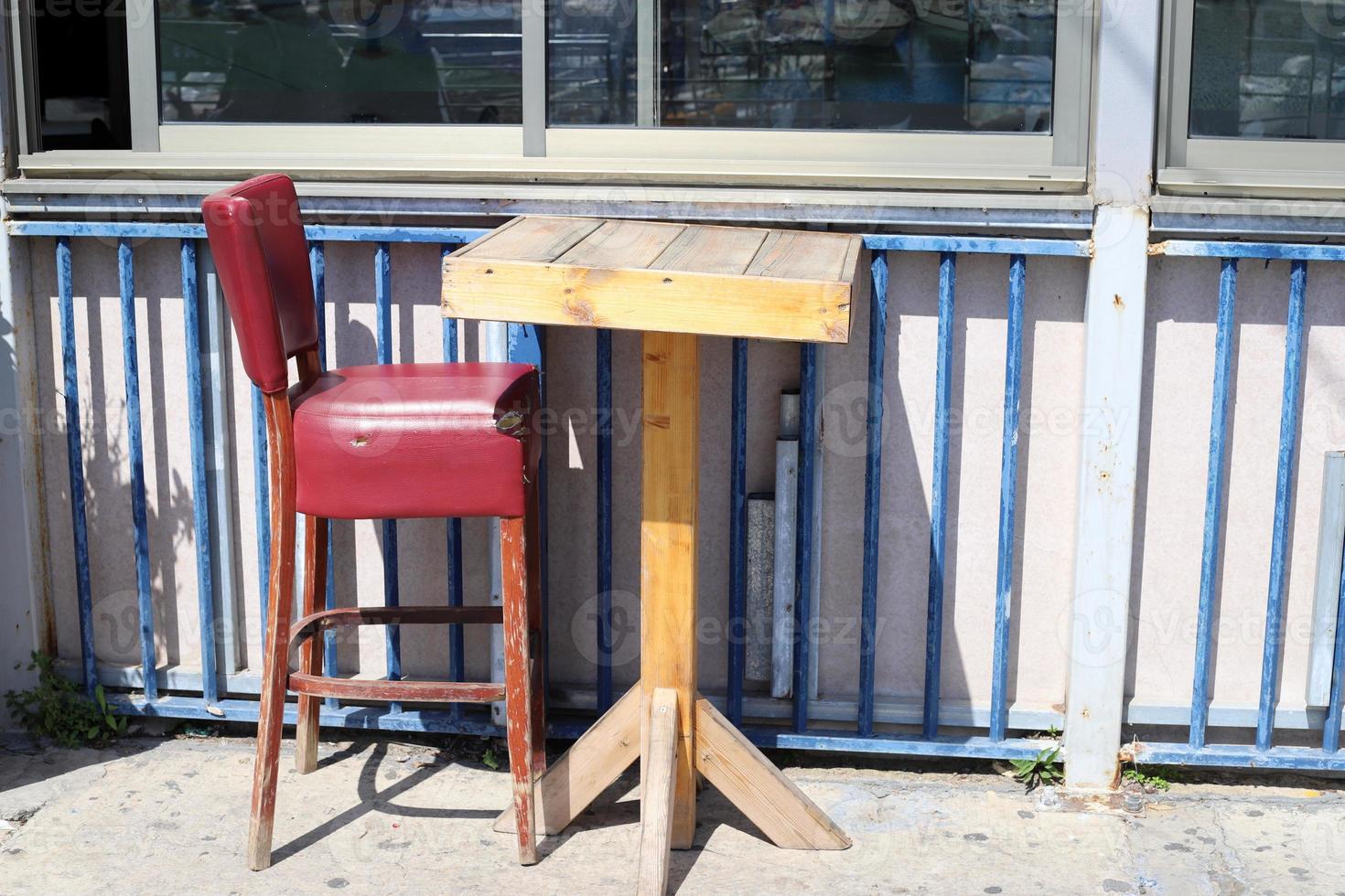 Chair for relaxing in a cafe on the Mediterranean coast photo