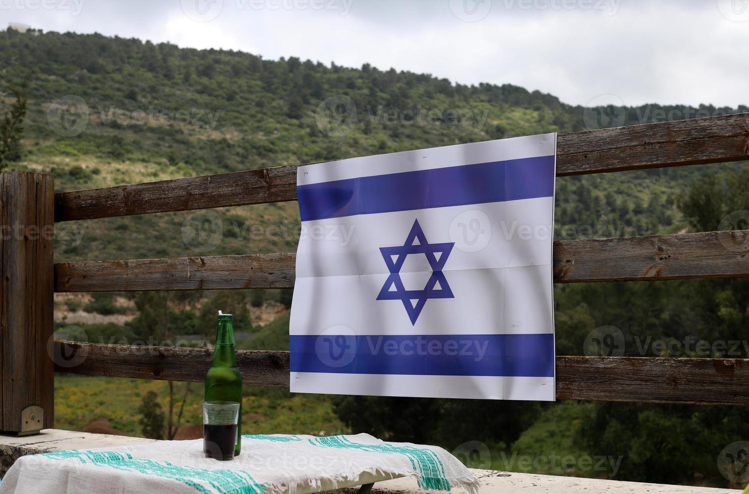 The blue and white Israeli flag with the Star of David. photo