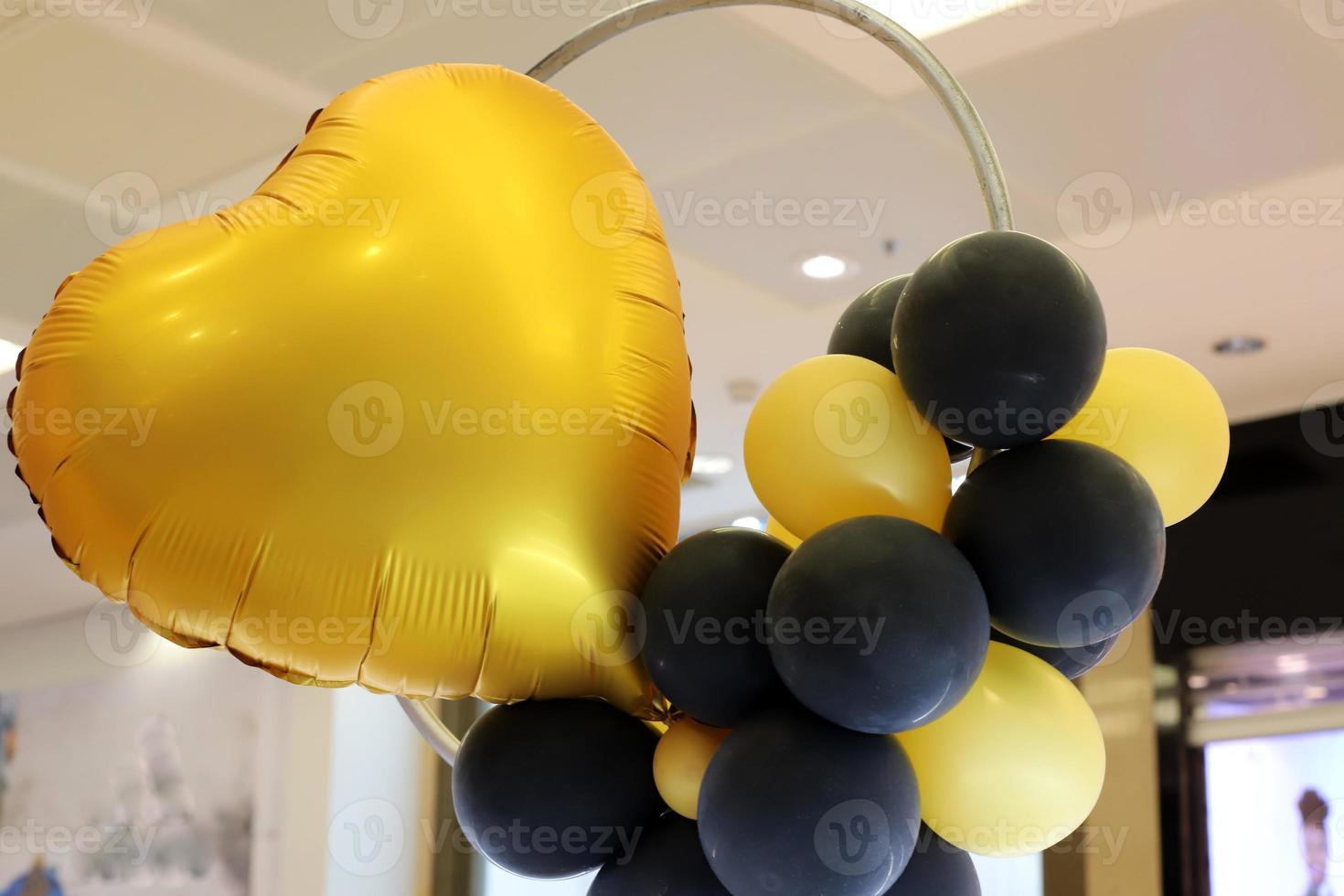 Balloons in a city park on the seashore. photo