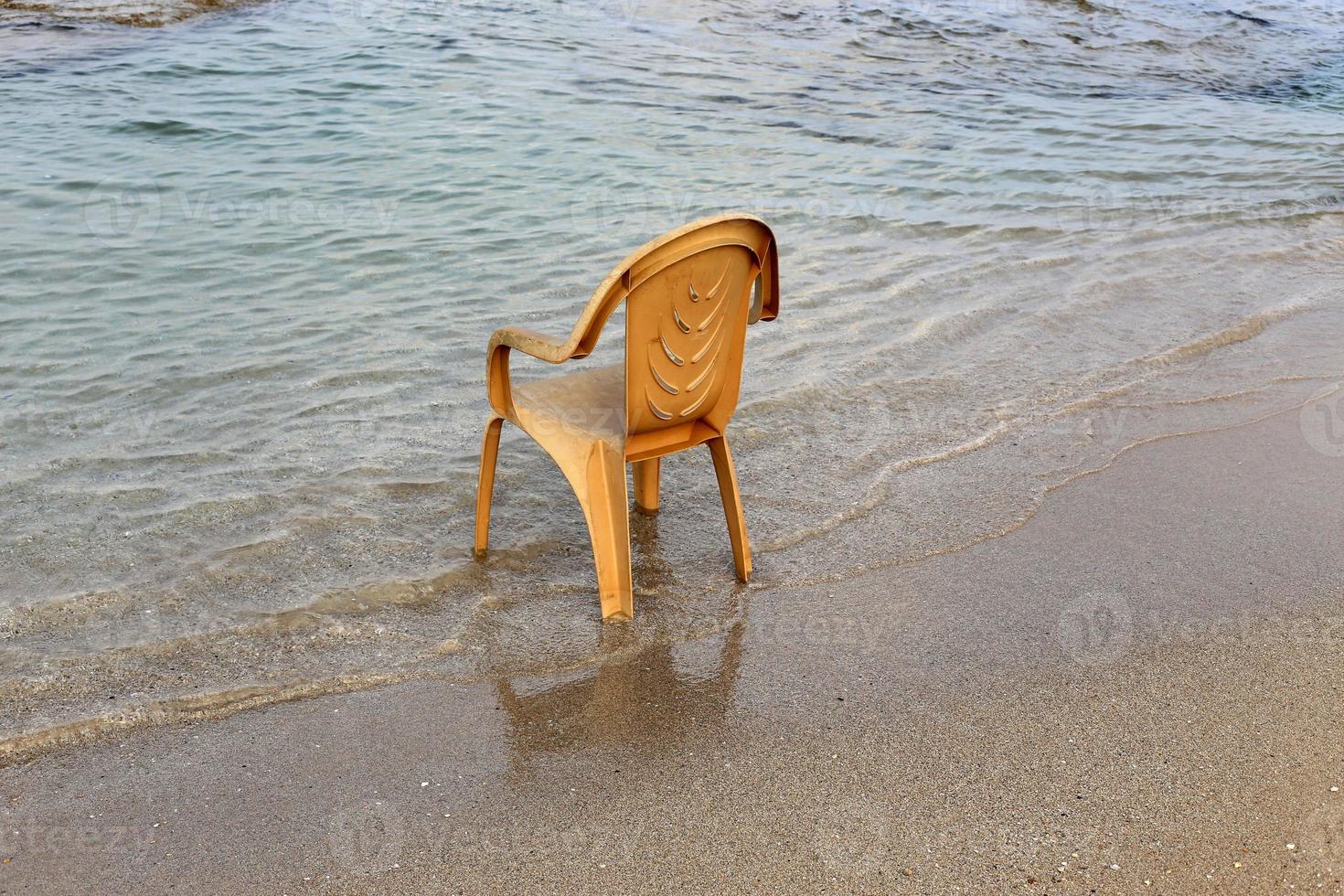 Chair for relaxing in a cafe on the Mediterranean coast photo