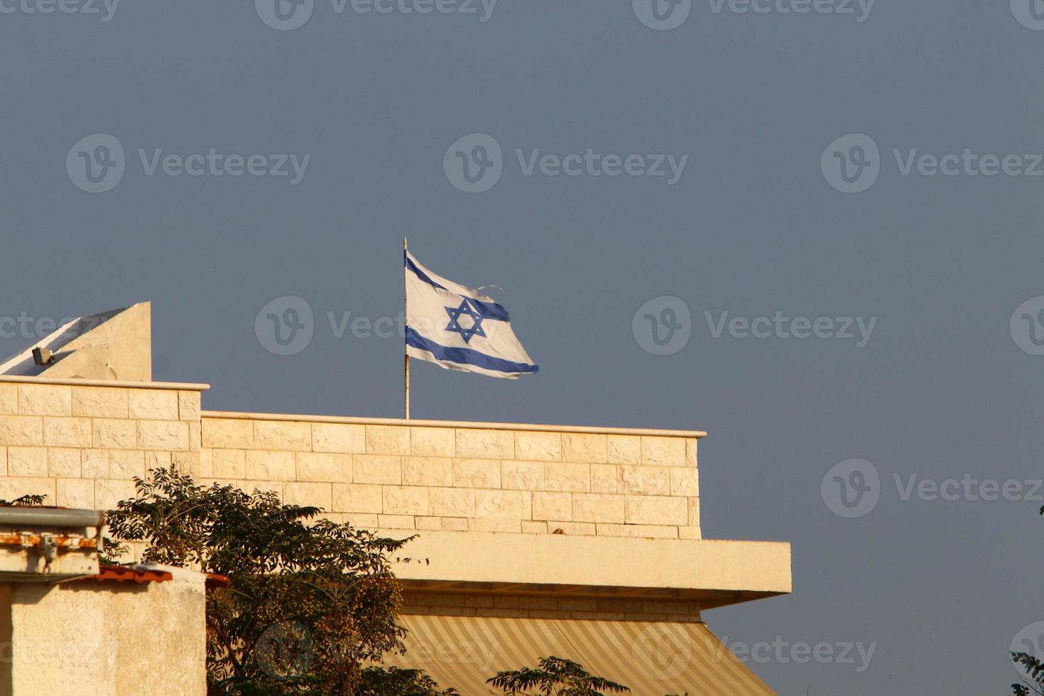 The blue and white Israeli flag with the Star of David. photo