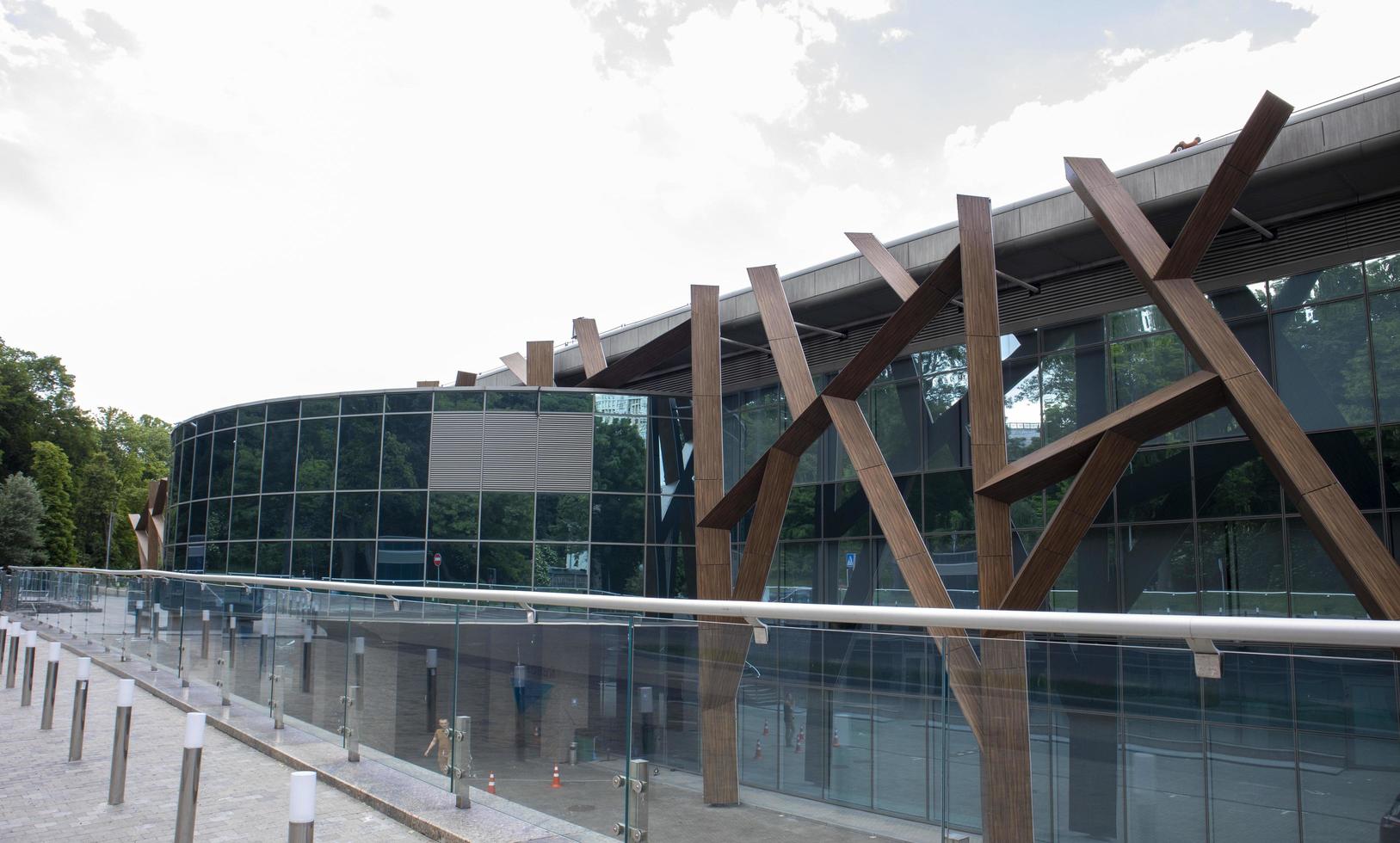 Congress and exhibition center Parkovy with a helipad. Business center in Kyiv. Modern building. Helicopter Maydanchik of Yanukovych. Ukraine, Kyiv - June 9, 2022. photo