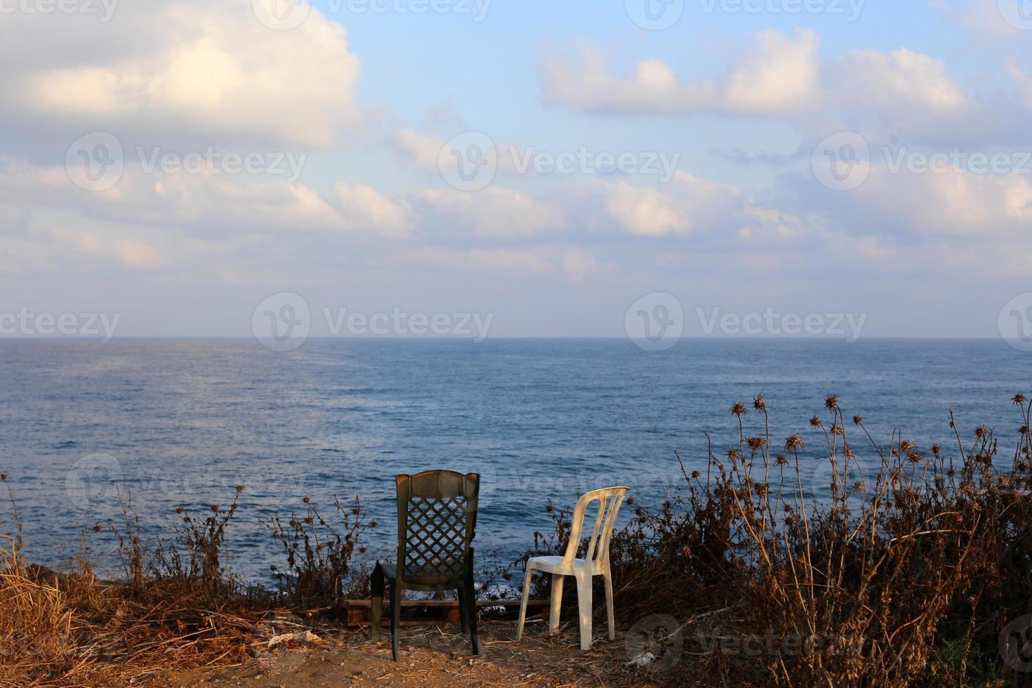 Chair for relaxing in a cafe on the Mediterranean coast photo