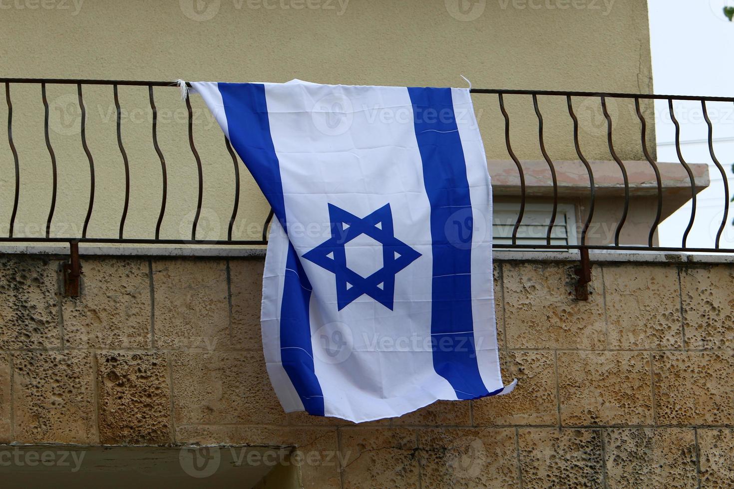 The blue and white Israeli flag with the Star of David. photo