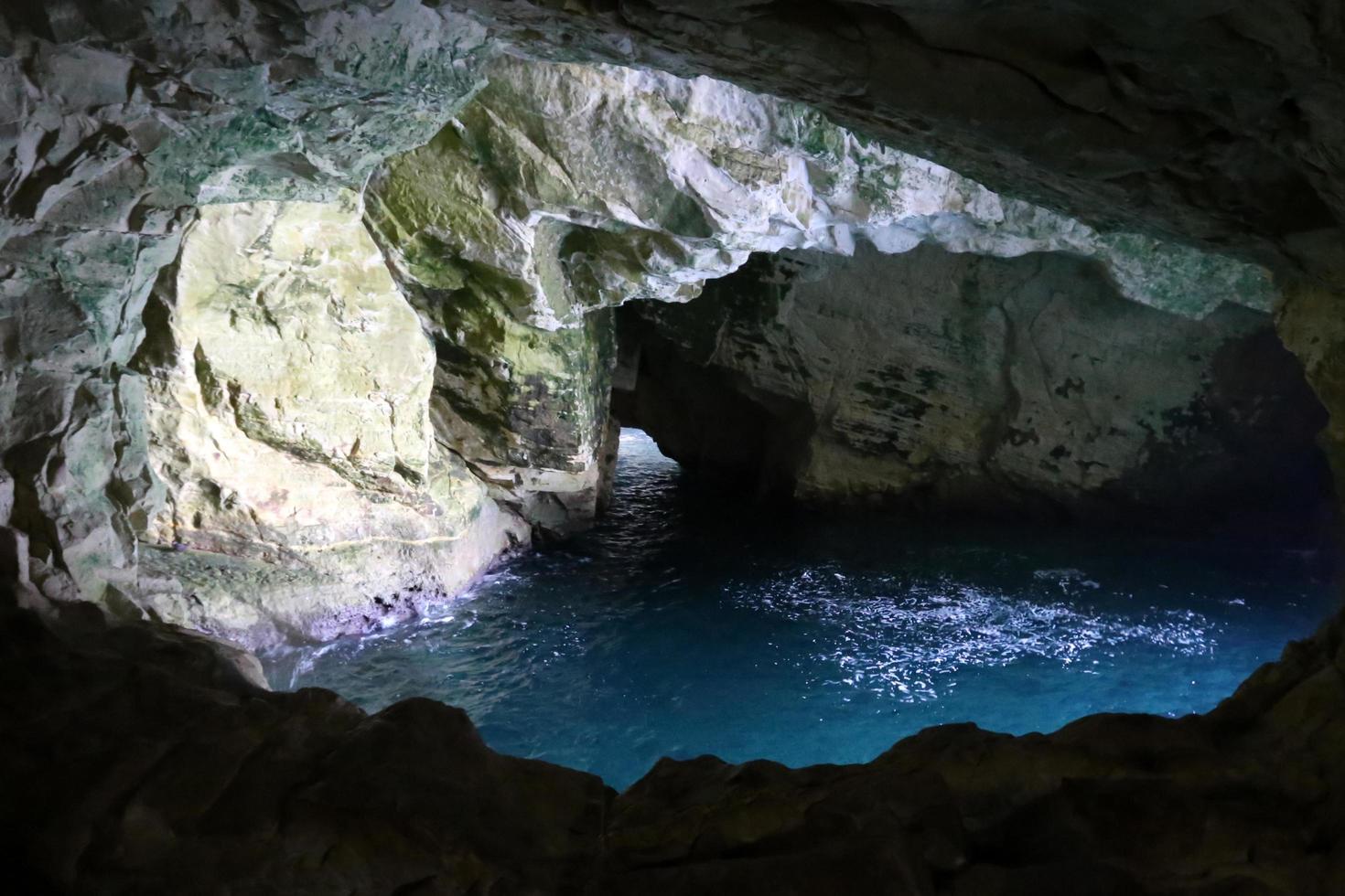 Nahariya Israel August 17, 2019. Grottoes in the chalk cliffs on the shores of the Mediterranean Sea. photo