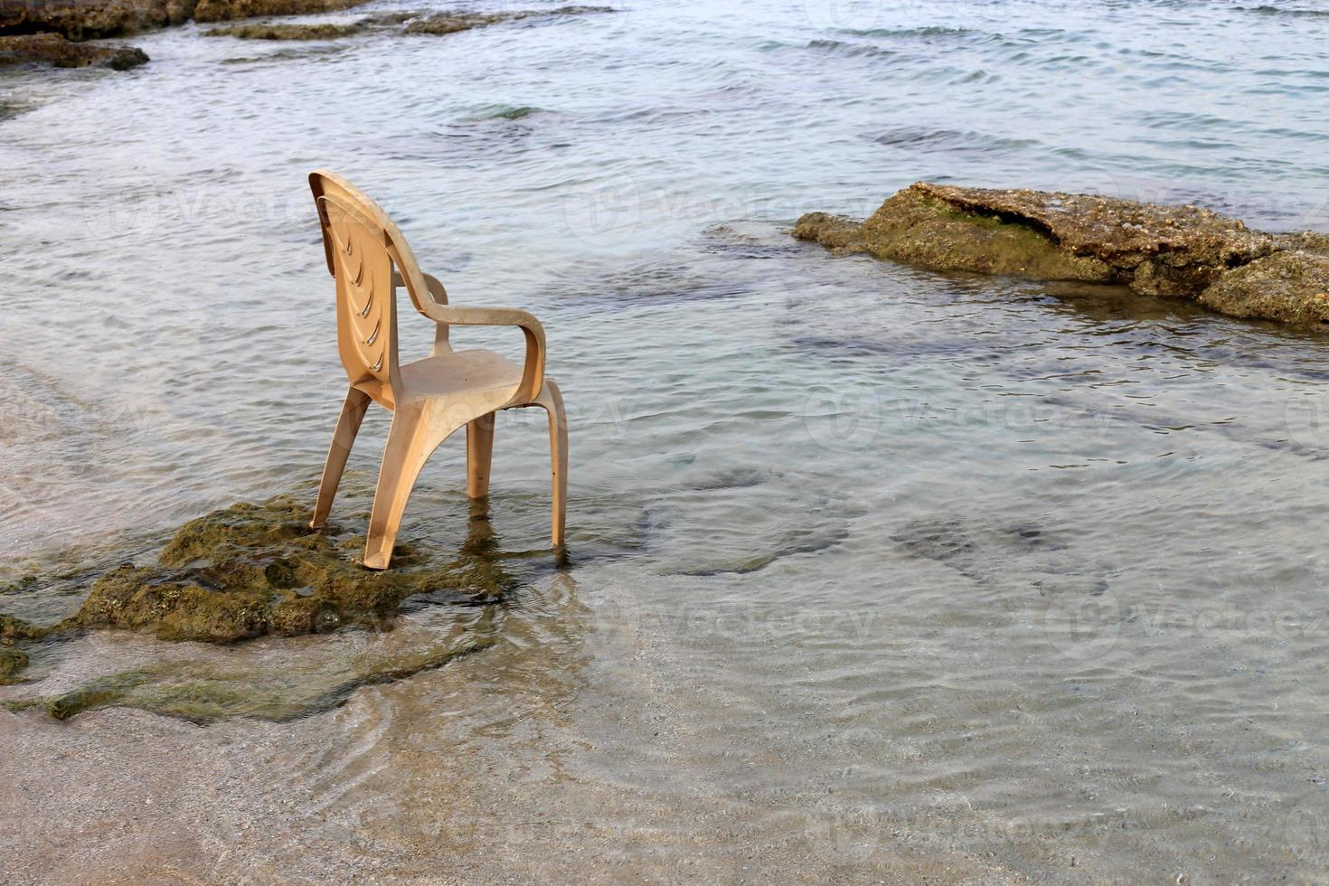 Chair for relaxing in a cafe on the Mediterranean coast photo