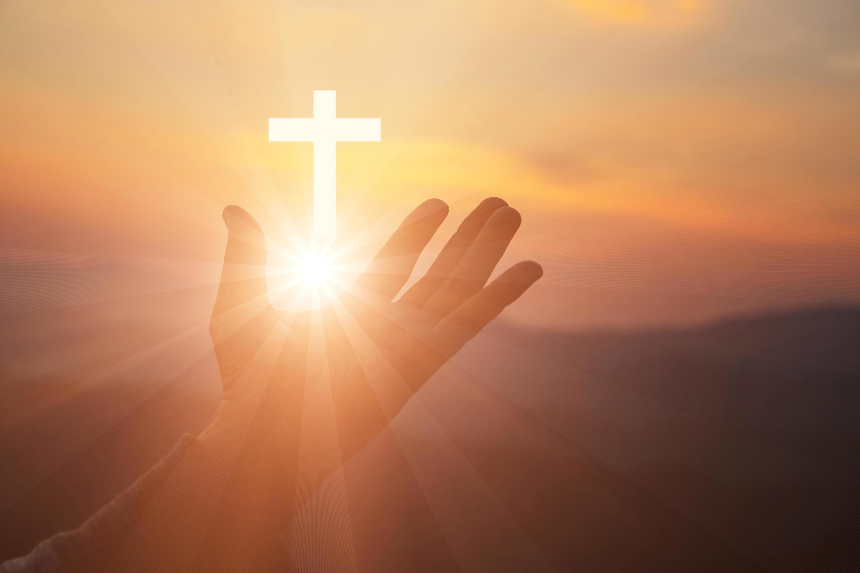 Silhouette of human hands palm up praying and worship of cross, eucharist  therapy bless god helping, belief, forgiveness, freedom, hope and faith,  christian religion concept on sunset background. 10621904 Stock Photo at