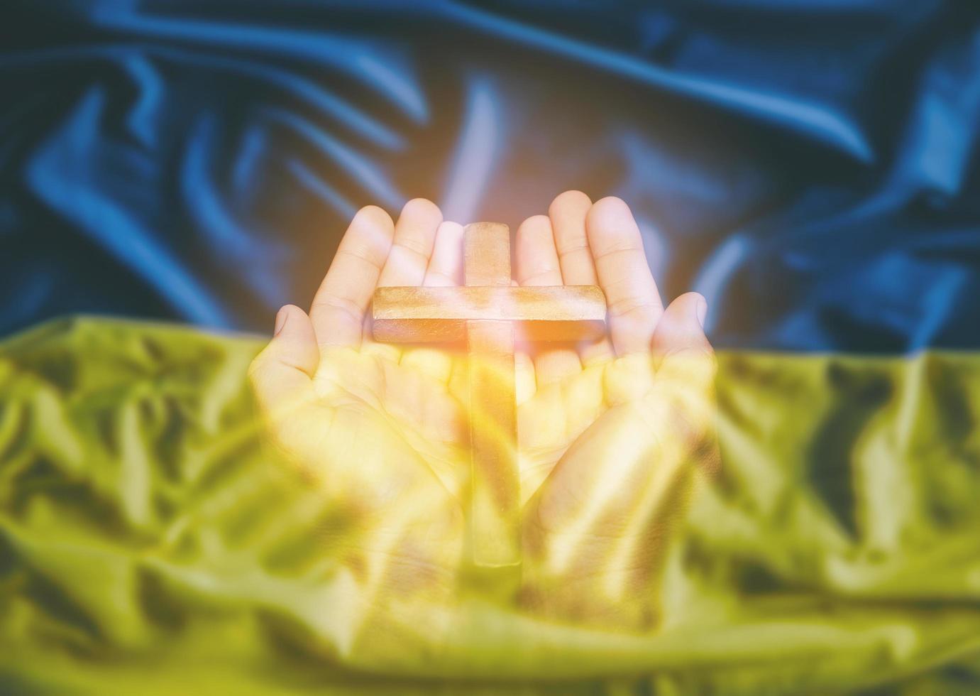 Pray for Ukraine, flag Ukraine. Russia vs Ukraine stop war. Pray Ukraine, eucharist therapy bless god helping, belief, forgiveness, freedom, hope and faith, christian religion concept photo