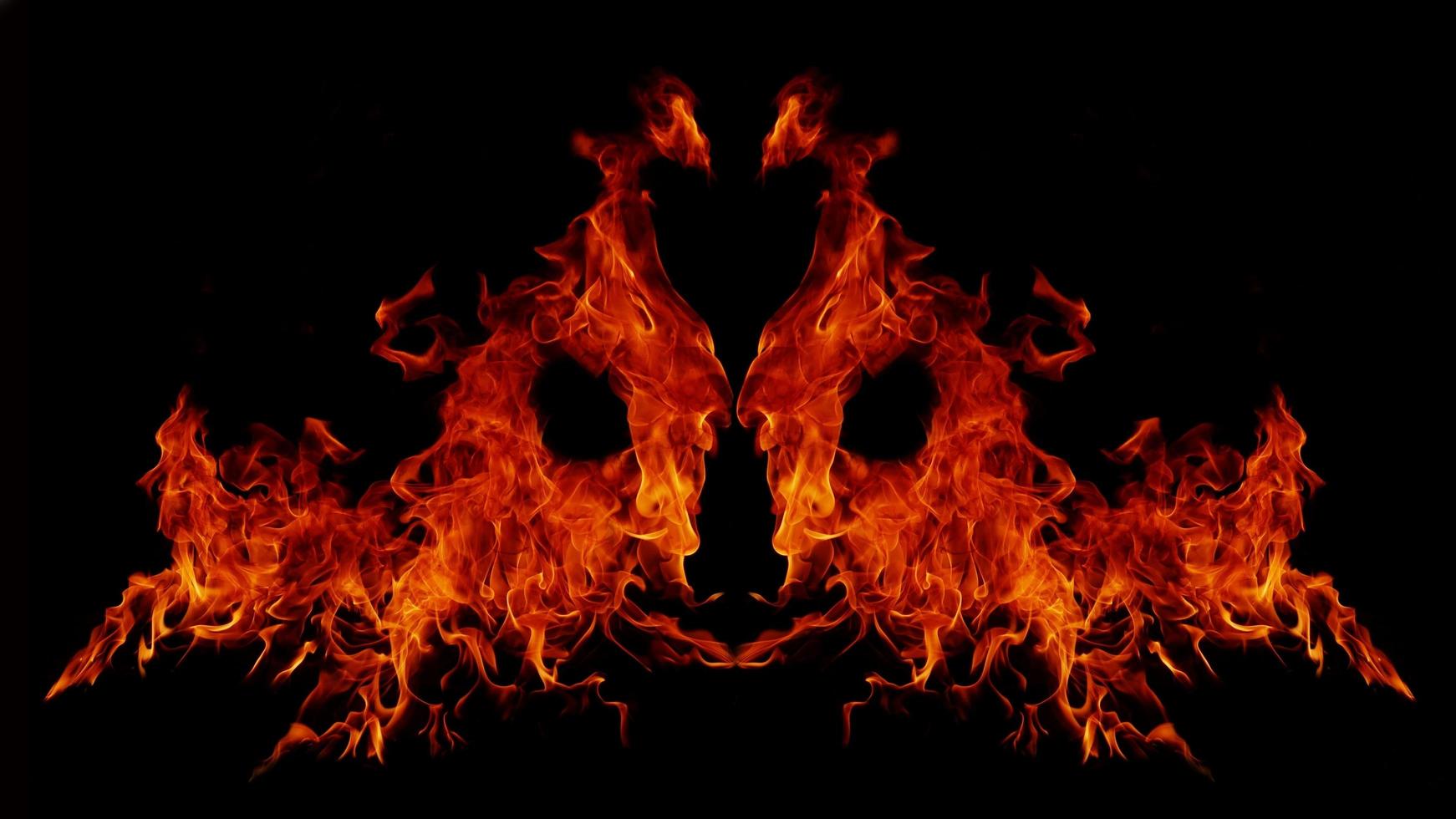 Flame Flame Texture For Strange Shape Fire Background Flame meat that is burned from the stove or from cooking. danger feeling abstract black background Suitable for banners or advertisements. photo