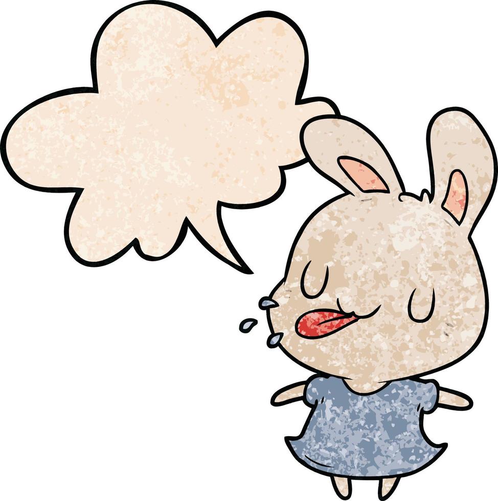 cute cartoon rabbit blowing raspberry and speech bubble in retro texture style vector
