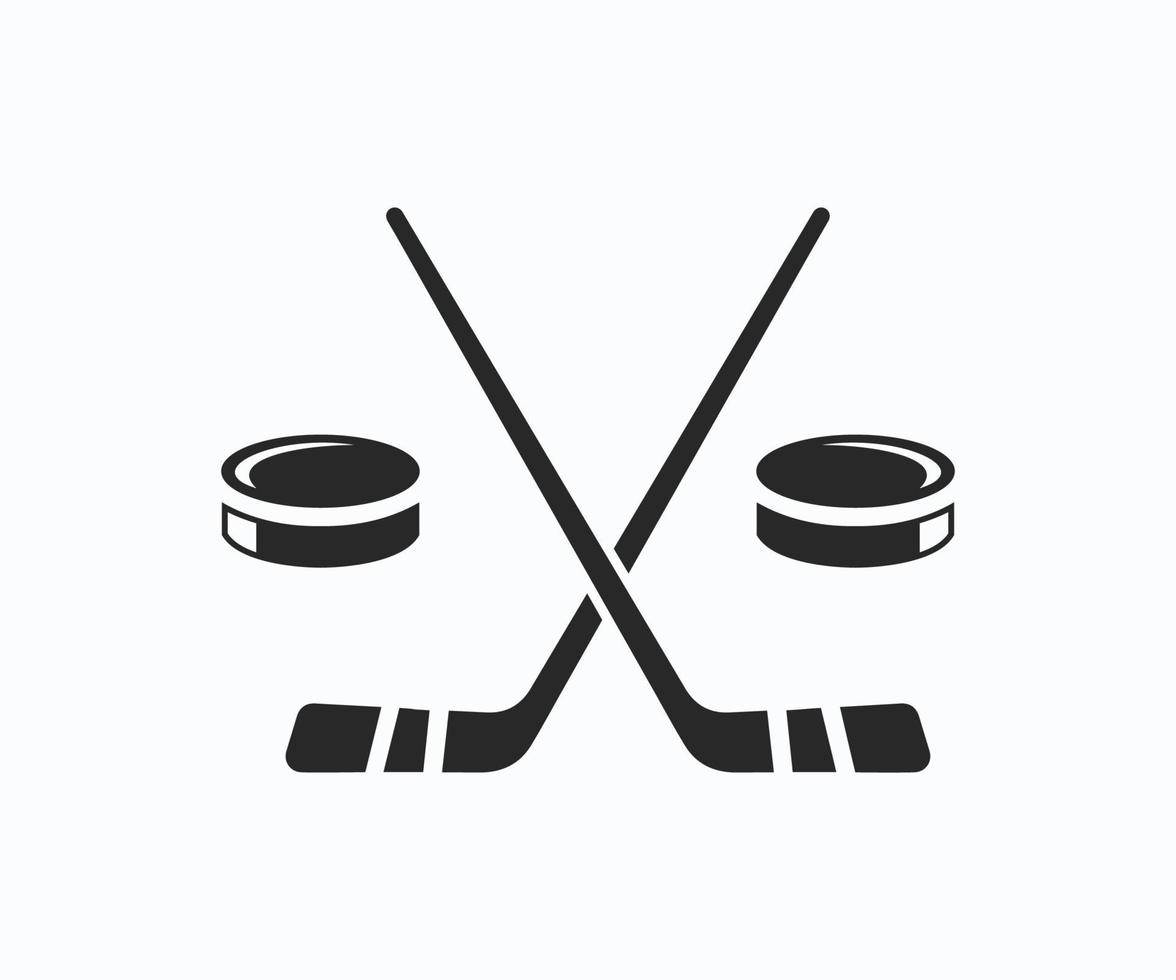 Ice hockey - two hockey sticks and puck