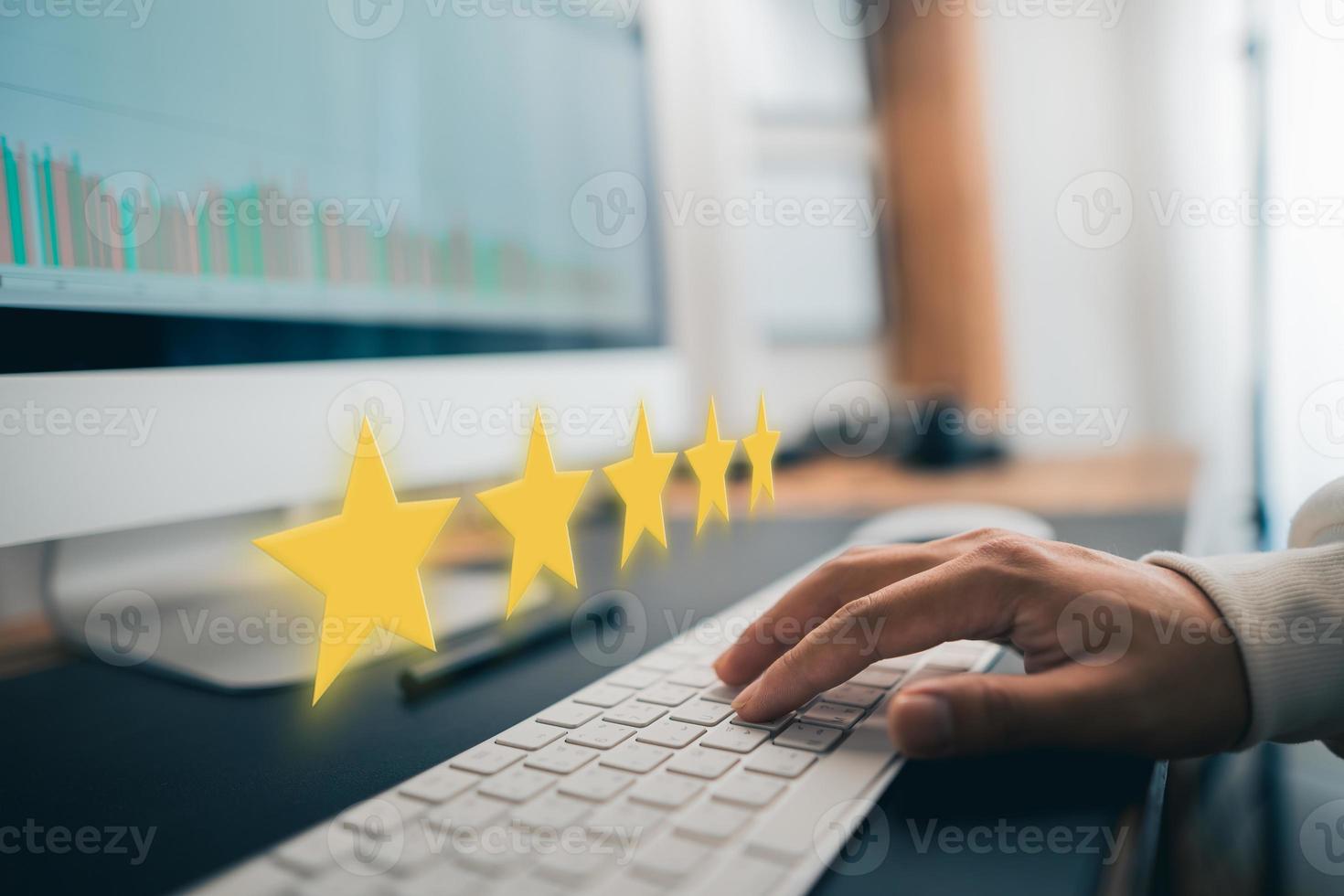 Hand and Phone With Five Star Rating photo