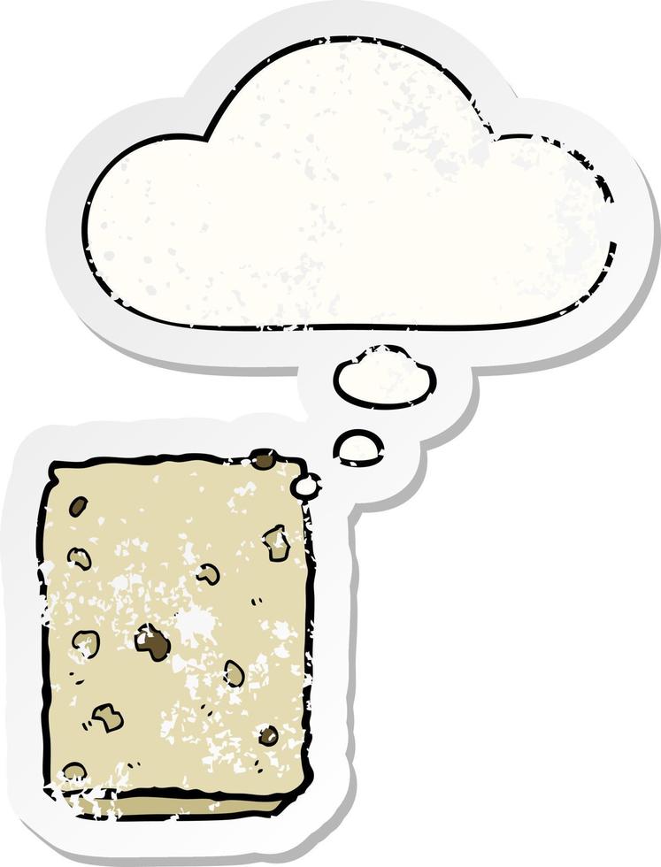 cartoon biscuit and thought bubble as a distressed worn sticker vector