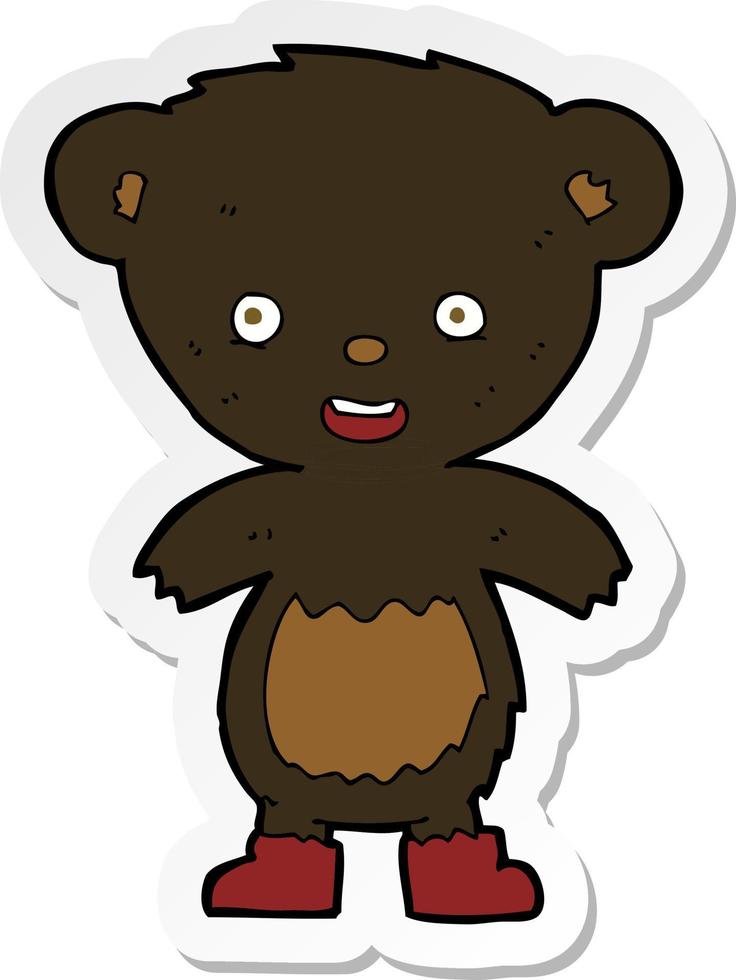 sticker of a cartoon black bear cub vector