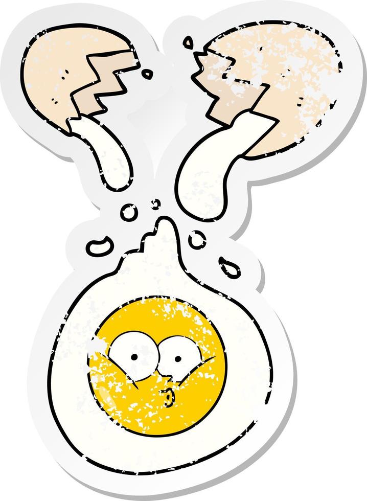 distressed sticker of a cartoon cracked egg vector