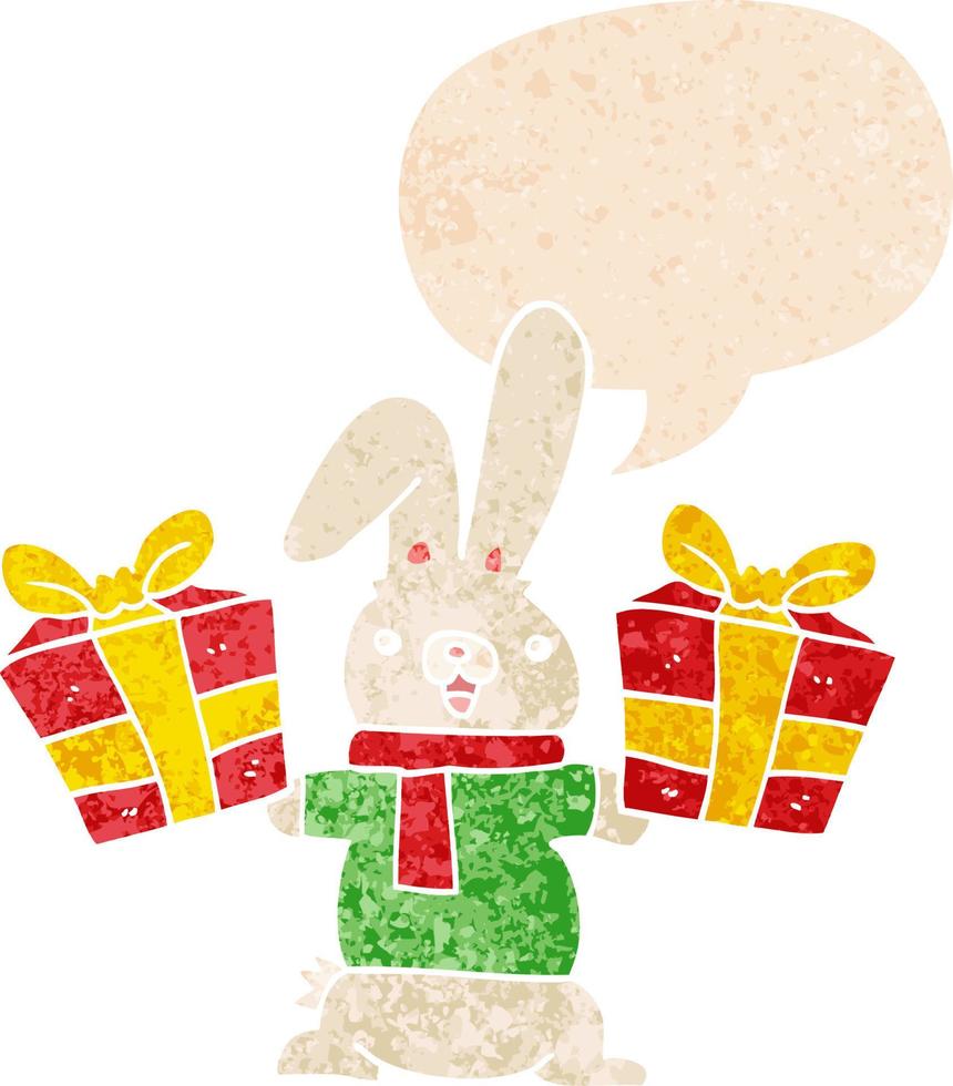 cartoon rabbit with christmas presents and speech bubble in retro textured style vector