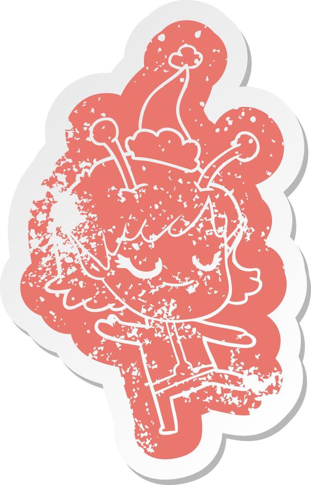 smiling alien girl cartoon distressed sticker of a wearing santa hat vector
