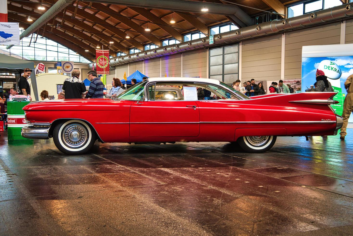 FRIEDRICHSHAFEN - MAY 2019 white red CADILLAC COUPE DE VILLE 1959 coupe at Motorworld Classics Bodensee on May 11, 2019 in Friedrichshafen, Germany photo