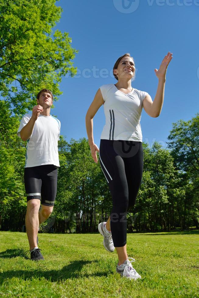 Young couple jogging photo