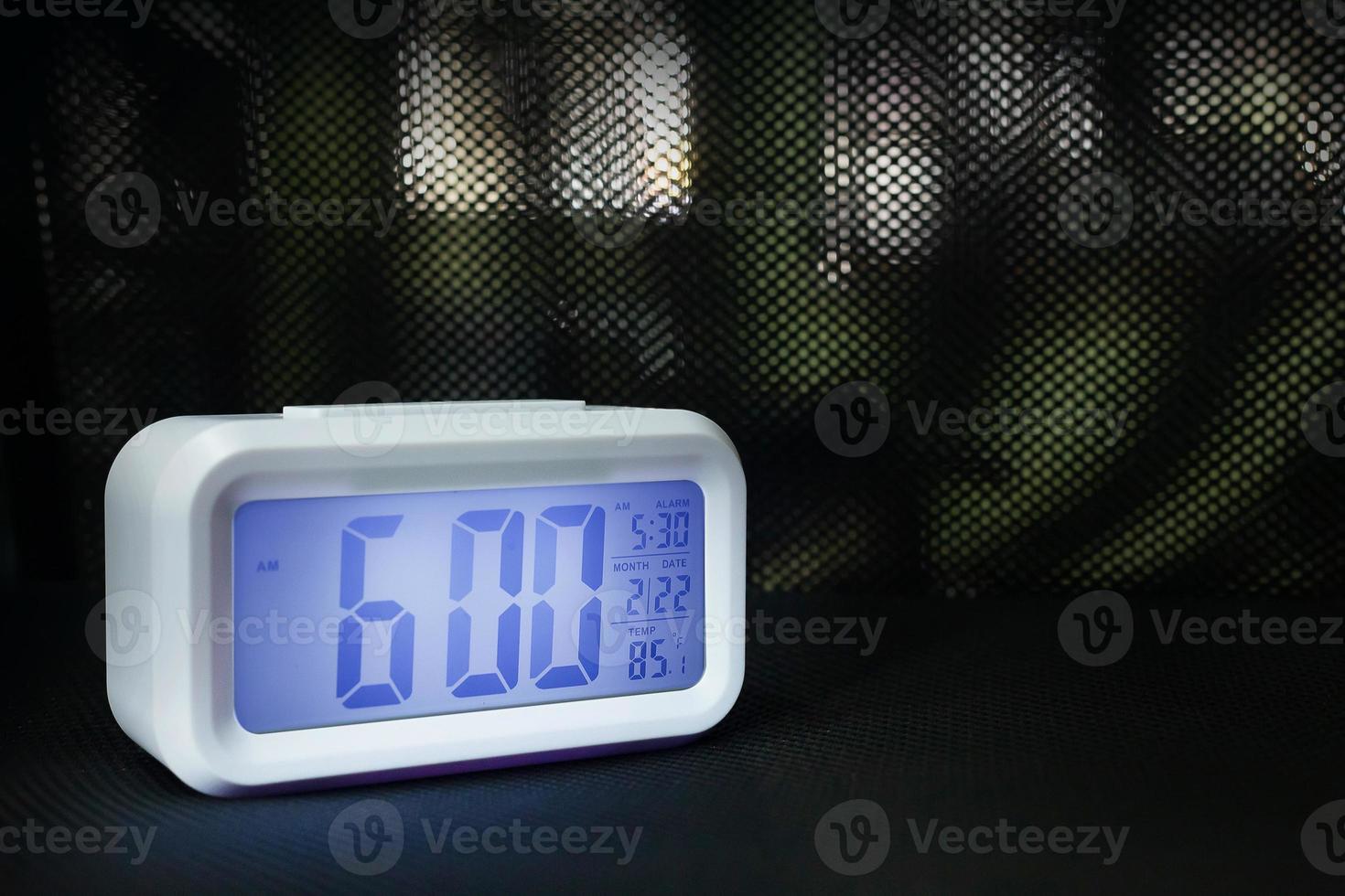 Digital alarm clock  6am close up image. photo