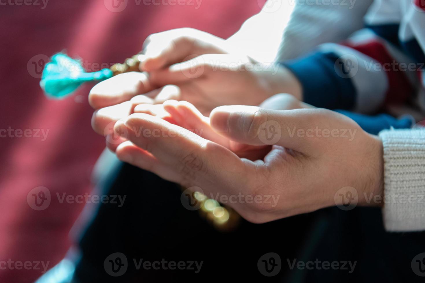 muslim prayer father and son in mosque prayingtogether, islamic education concept photo