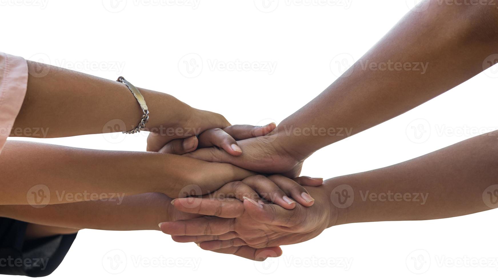 A close-up view of isolates, the hands of many Thai children are joining together. photo