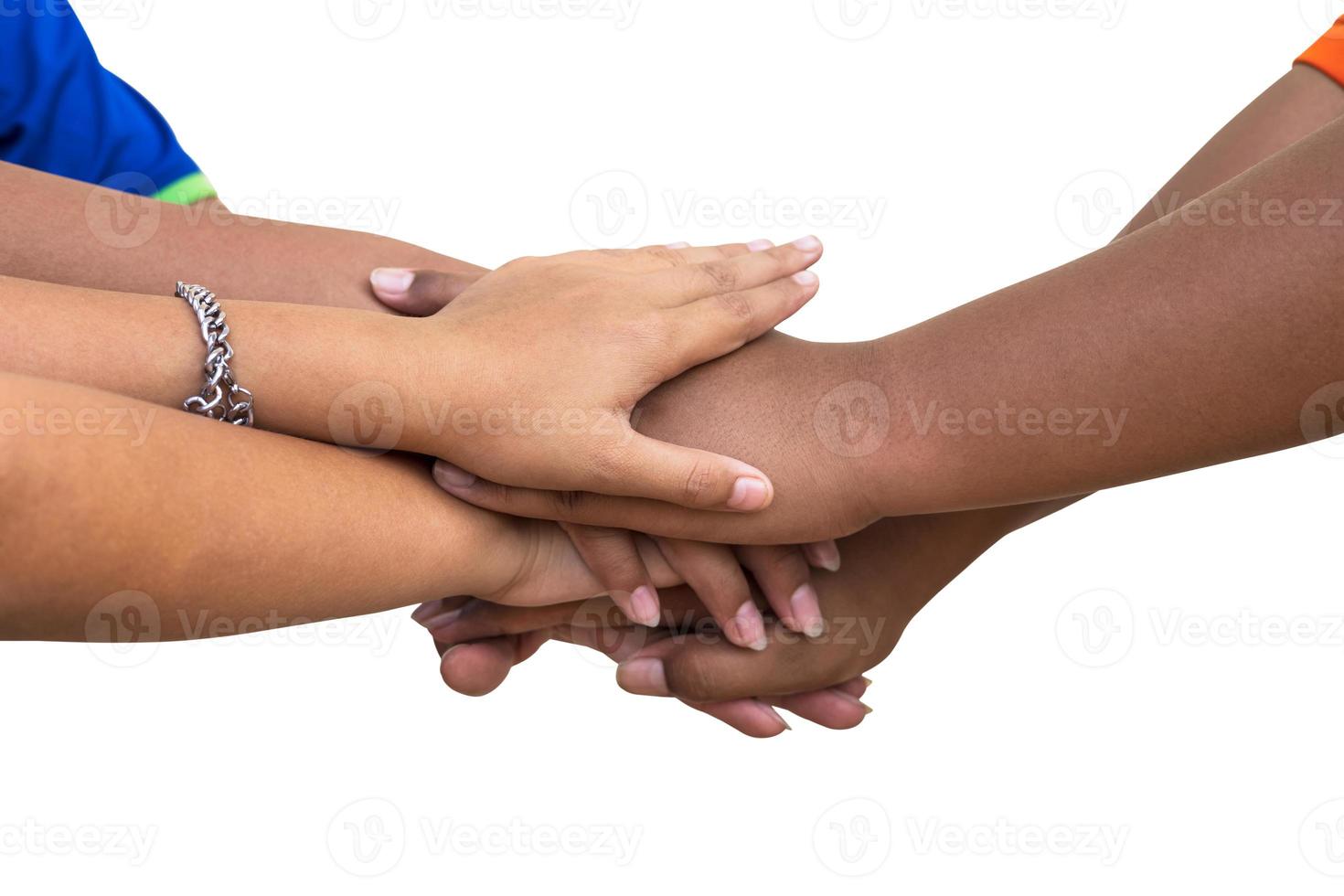 A close-up view of isolates, the hands of many Thai children are joining together. photo