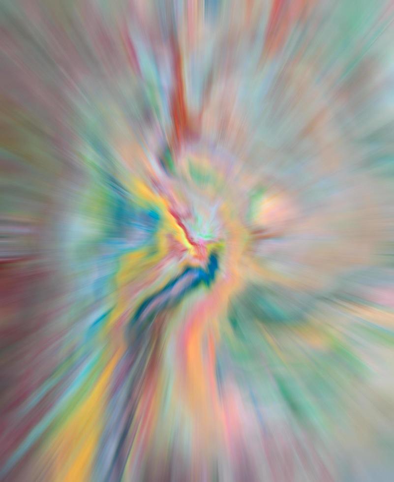 Abstract, blurry, radial plasticine background which combines various colors. photo