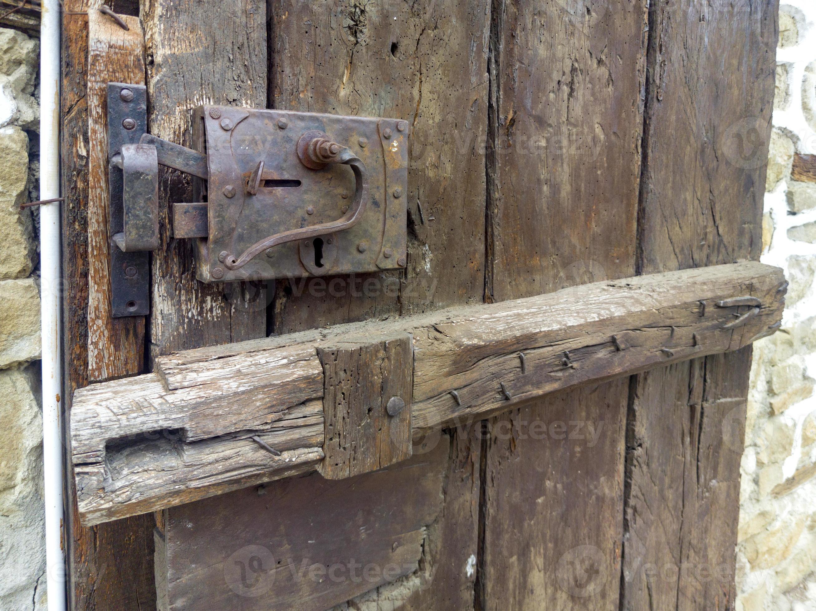 Old metal and wood lock of a wooden door. Close up 10645428 Stock Photo
