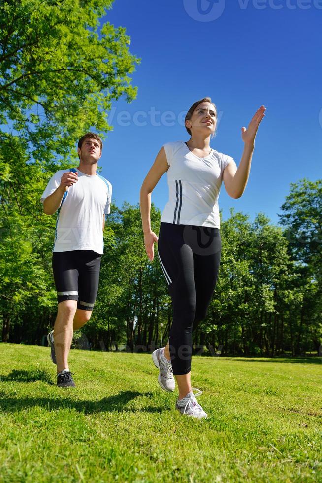 Couple jogging outside photo