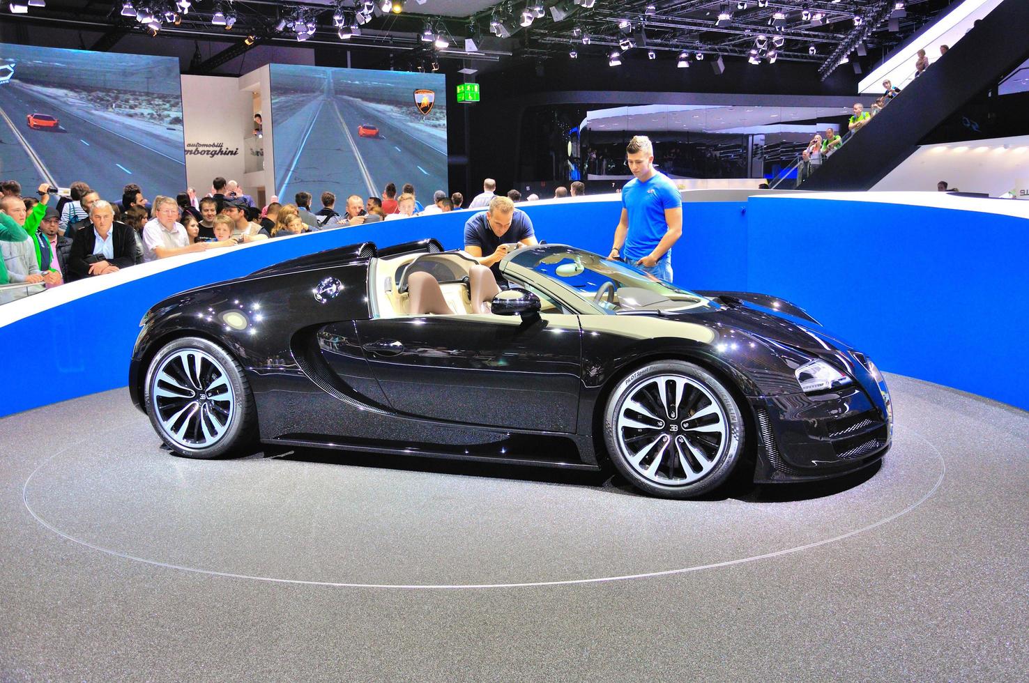 FRANKFURT - SEPT 14 Bugatti Veyron Grand Sport LOr Blanc presented as world premiere at the 65th IAA Internationale Automobil Ausstellung on September 14, 2013 in Frankfurt, Germany photo