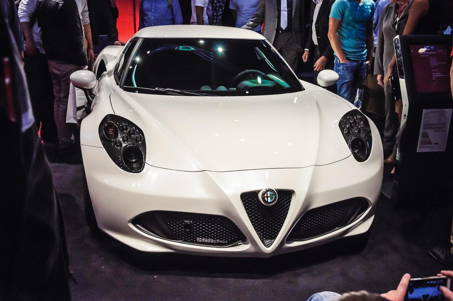 FRANKFURT - SEPT 21 ALFA ROMEO 4C presented as world premiere at the 65th IAA Internationale Automobil Ausstellung on September 21, 2013 in Frankfurt, Germany photo