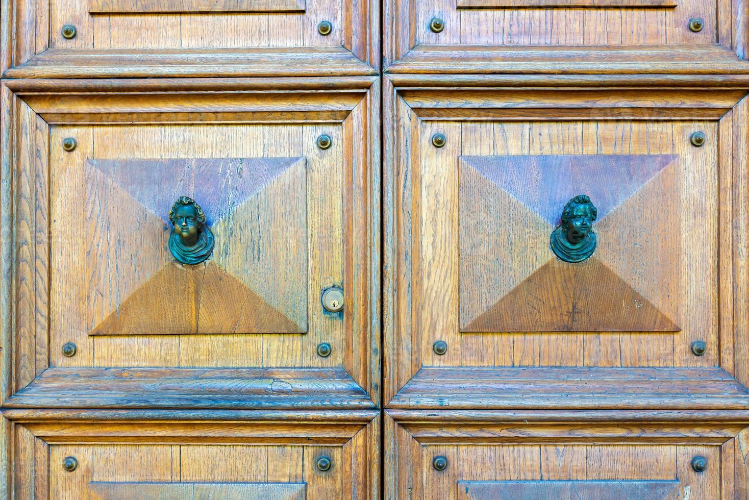 wooden door with two knobs photo