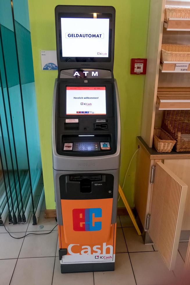 cash dispenser in a room photo