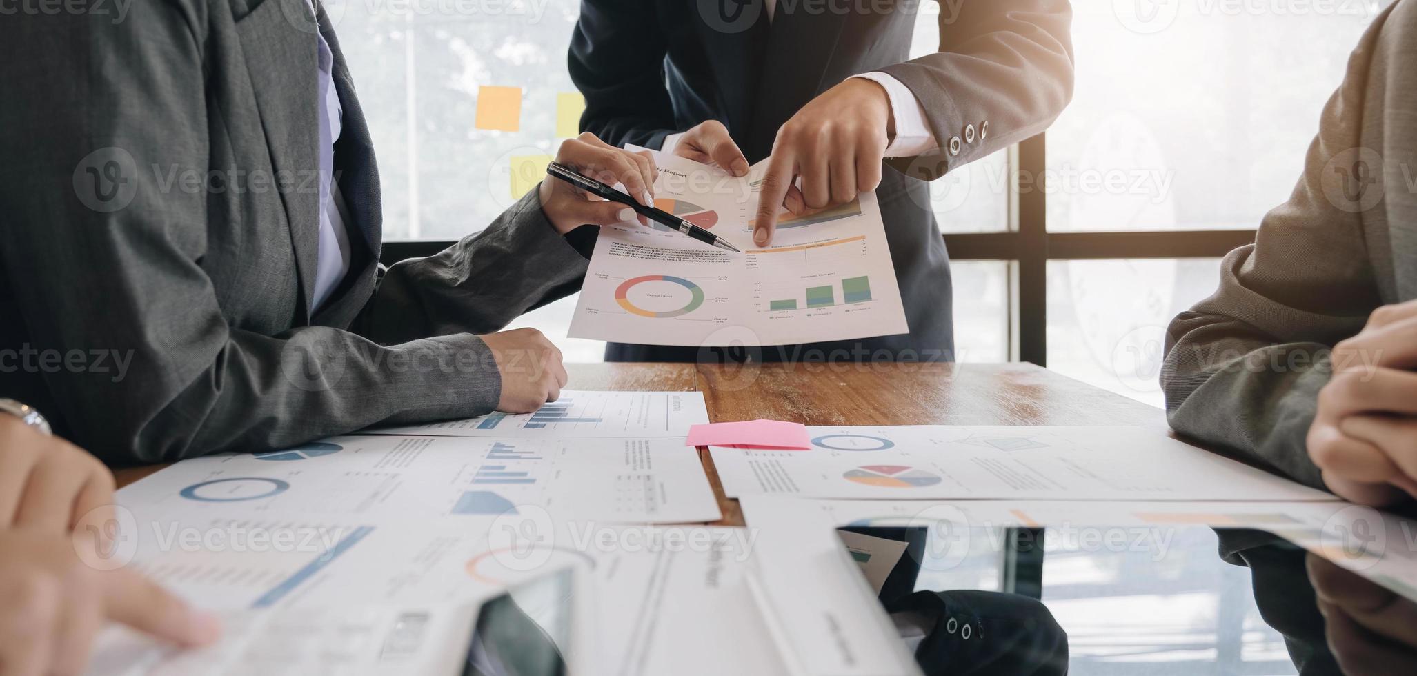 Team of business people working together in the meeting room office, teamwork background charts and graphs banner, double exposure successful teamwork,business planning concept. photo