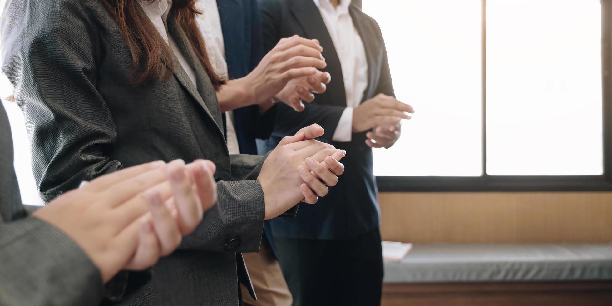 Business people clapping their hands, congratulation and appreciation concepts photo