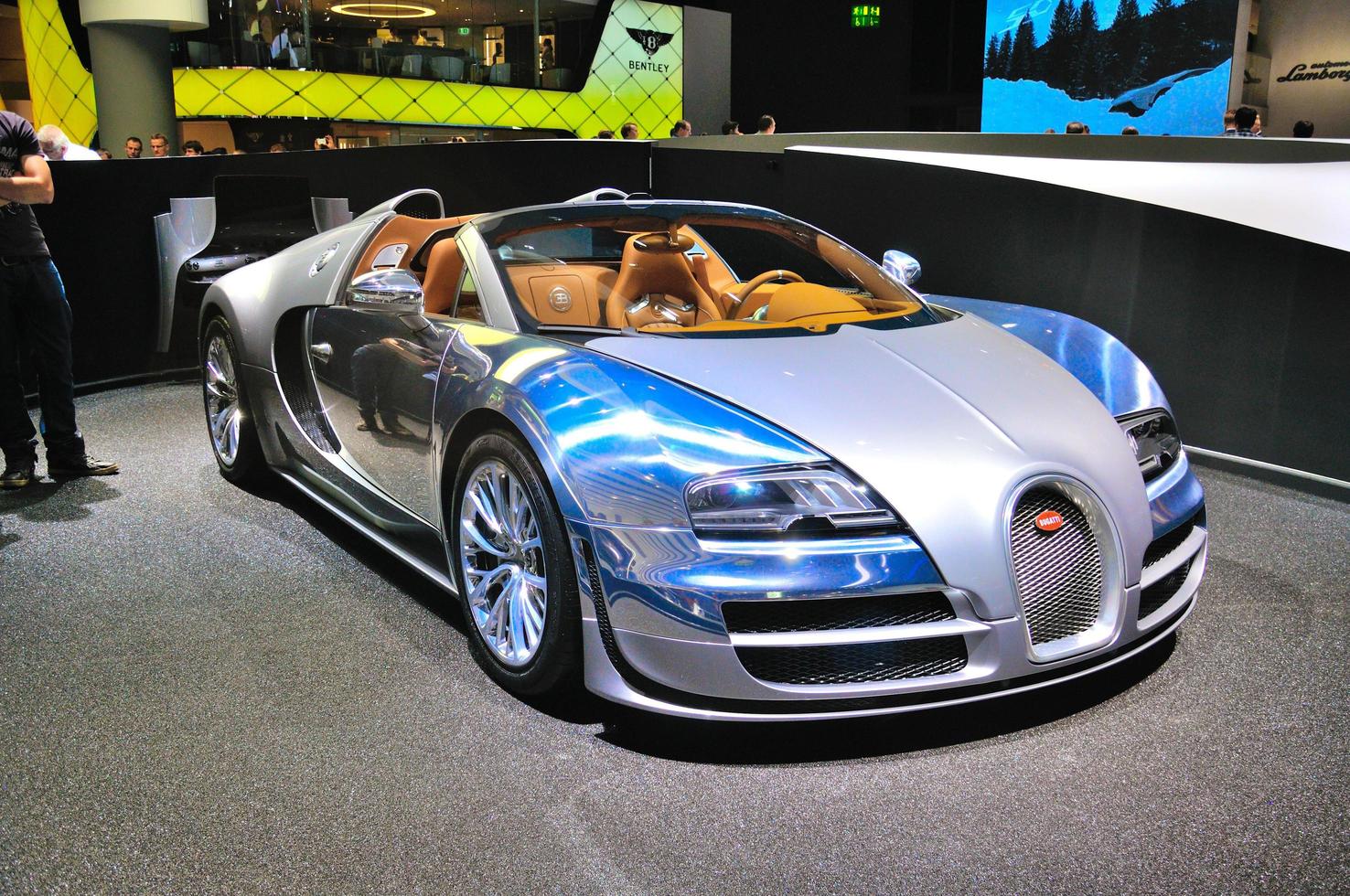 FRANKFURT - SEPT 14 Bugatti Veyron Grand Sport LOr Blanc presented as world premiere at the 65th IAA Internationale Automobil Ausstellung on September 14, 2013 in Frankfurt, Germany photo