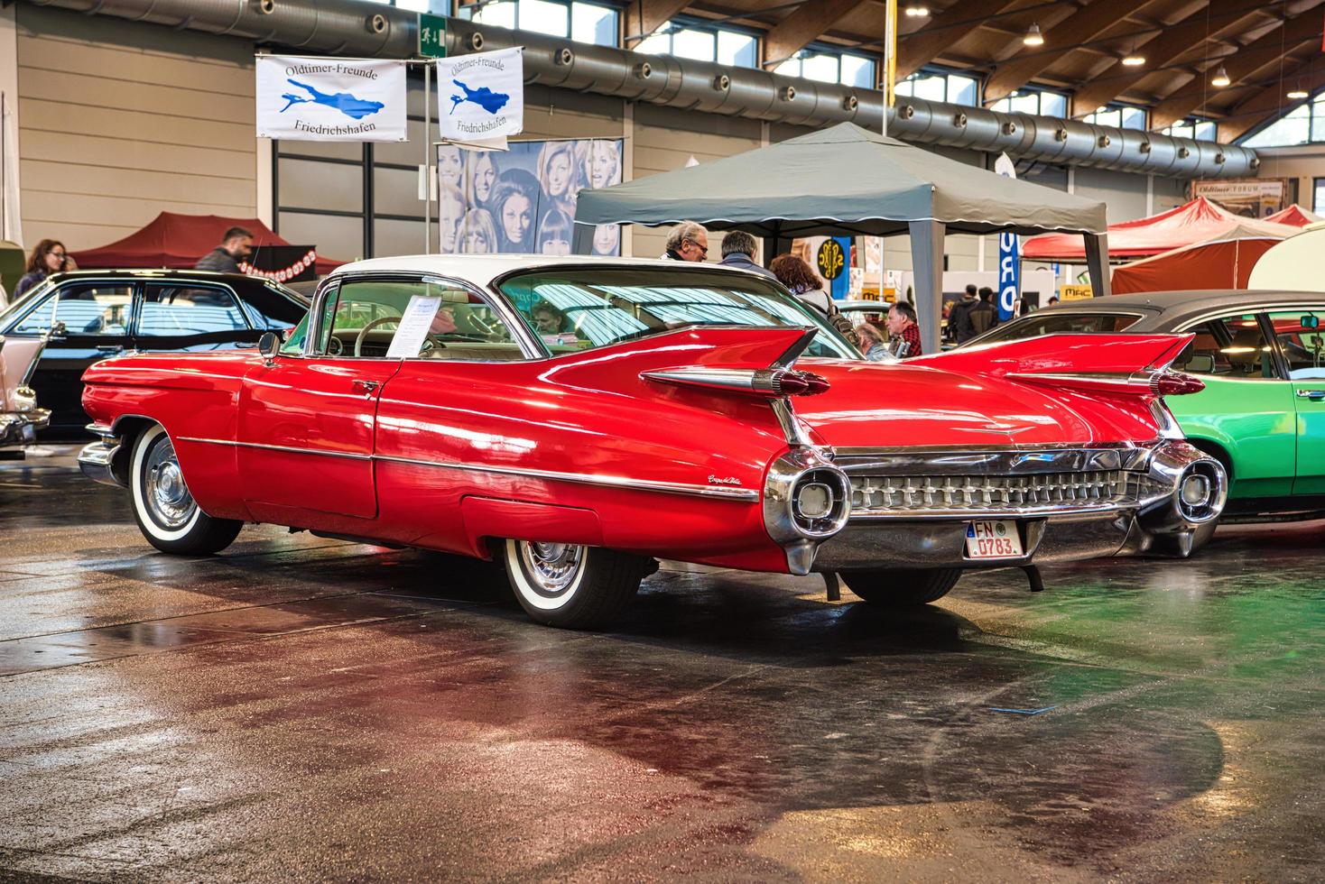 FRIEDRICHSHAFEN - MAY 2019 white red CADILLAC COUPE DE VILLE 1959 coupe at Motorworld Classics Bodensee on May 11, 2019 in Friedrichshafen, Germany photo
