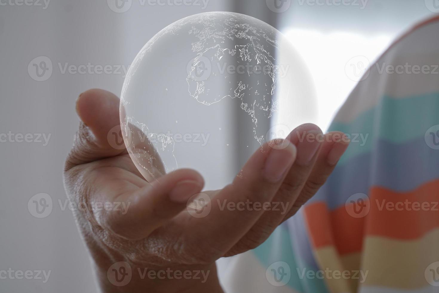 Hand that cherishes the globe elements of this image furnished by NASA photo