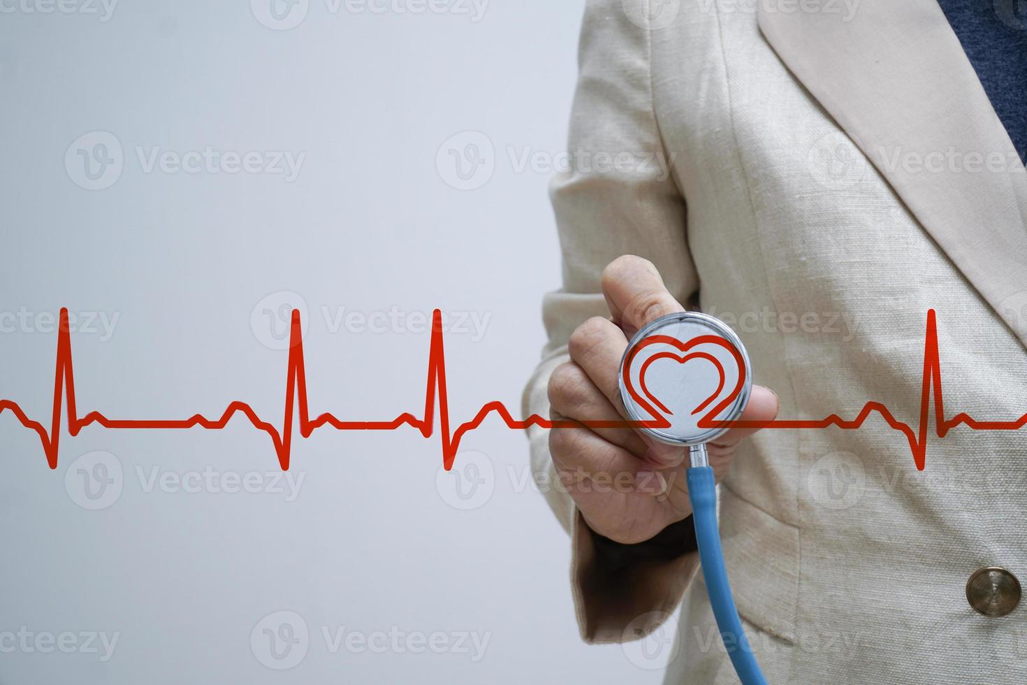 Stethoscope with heart and heartbeat. photo