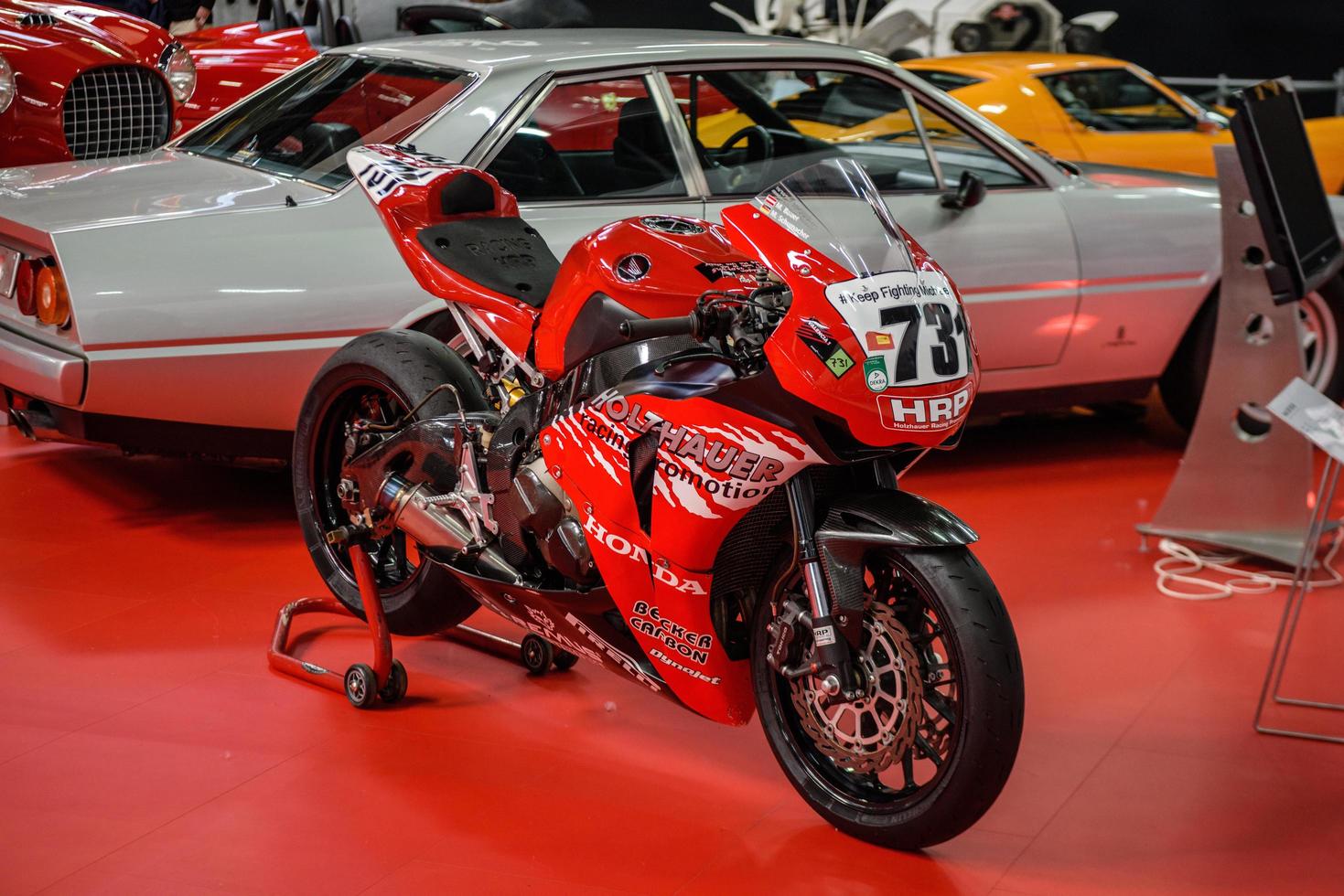 SINSHEIM, GERMANY - MAI 2022 red sports motorbike motorcycle Ho photo