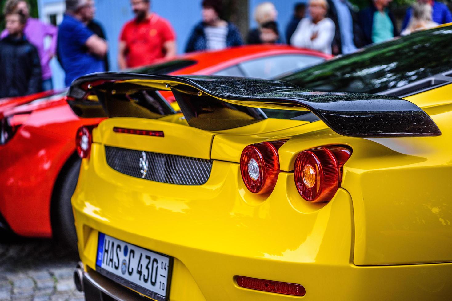 GERMANY, FULDA - JUL 2019 rearview lights of yellow FERRARI F430 Type F131 cabrio is a sports car produced by the Italian automobile manufacturer Ferrari from 2004 to 2009 as a successor to the Ferrar photo