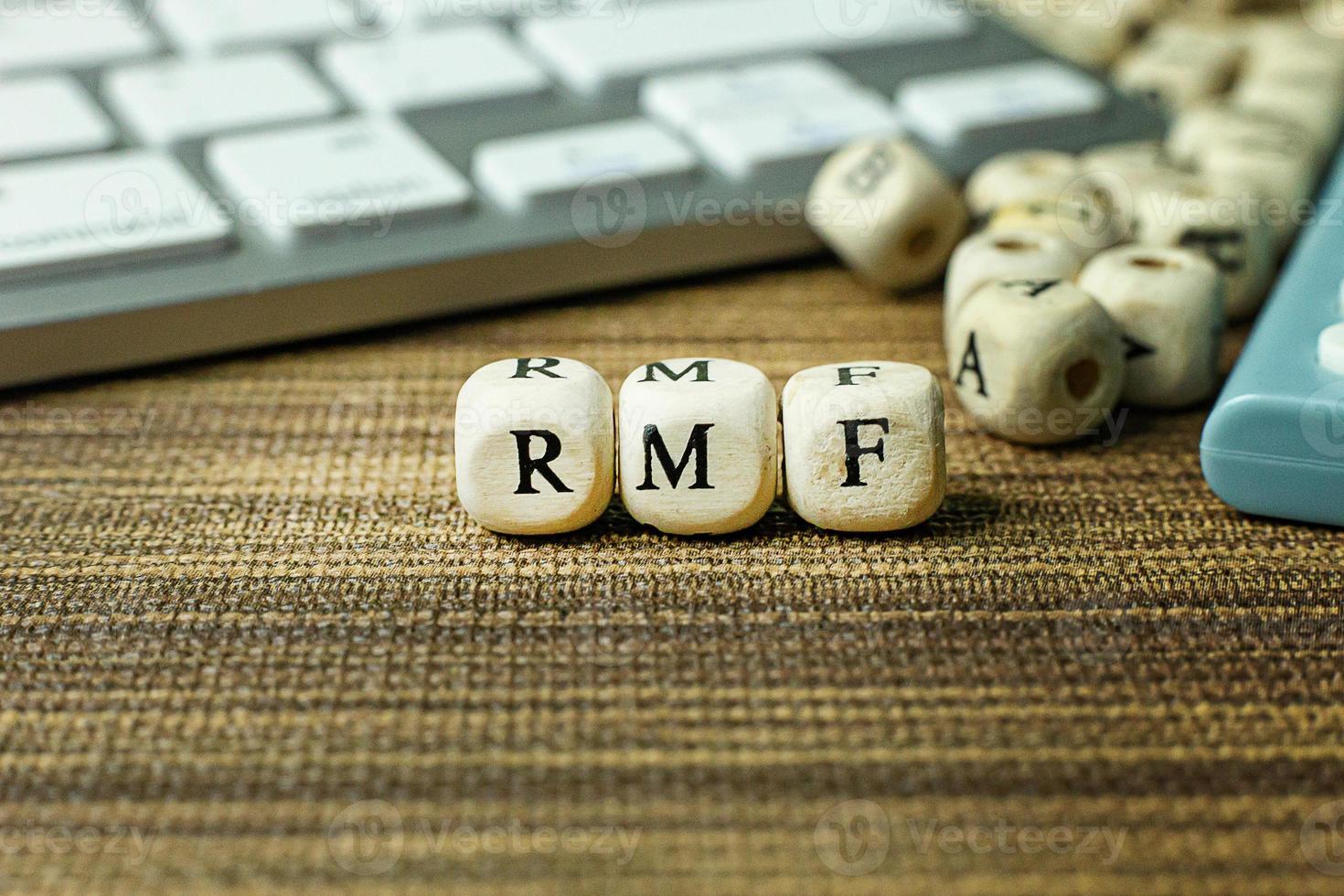 Text RMF on wooden cube for business content. photo