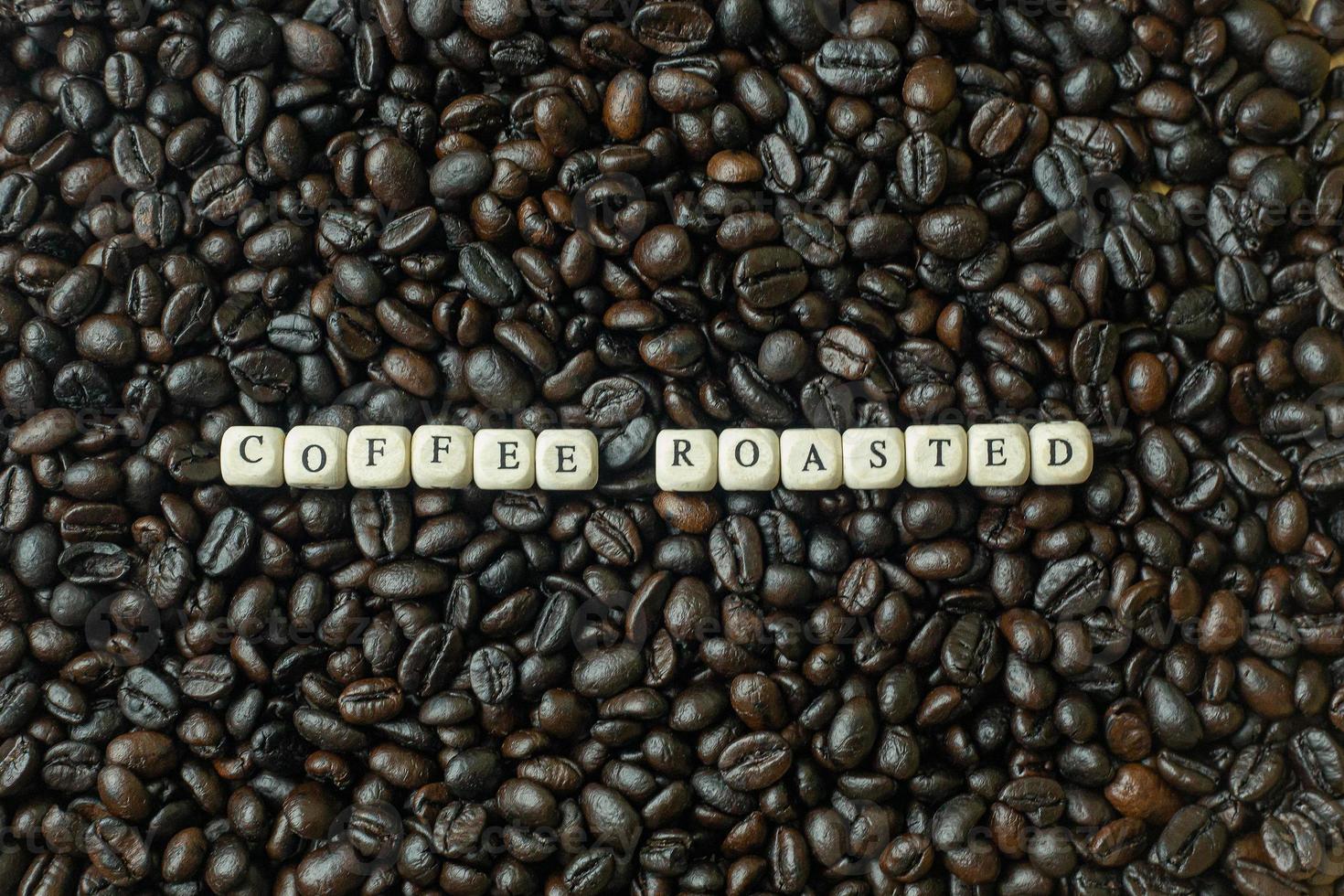 coffee roasted and text wood cube close up image. photo