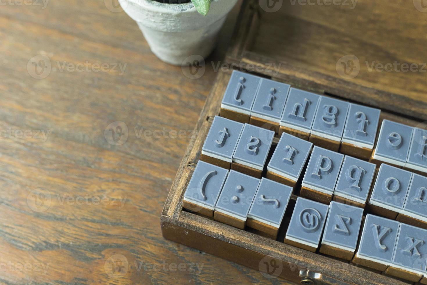 wood stamp alphabet close up image for background. photo