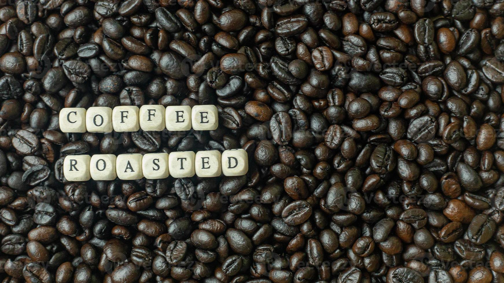 coffee roasted and text wood cube close up image. photo