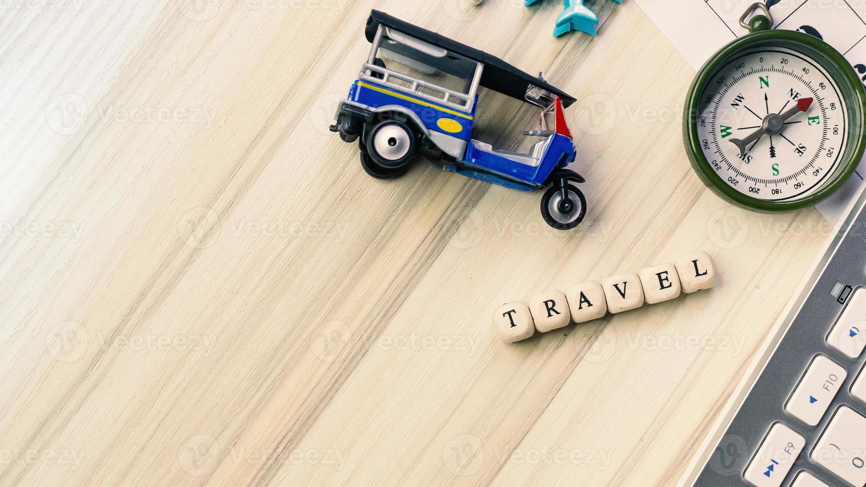 tuktuk on white  office  table for travel content. photo