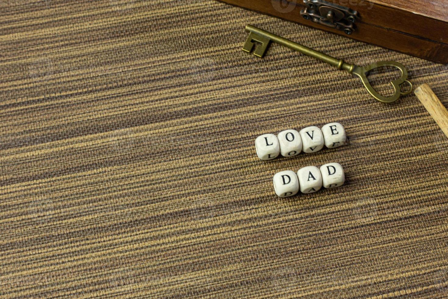 wooden text  for father day content close up image. photo