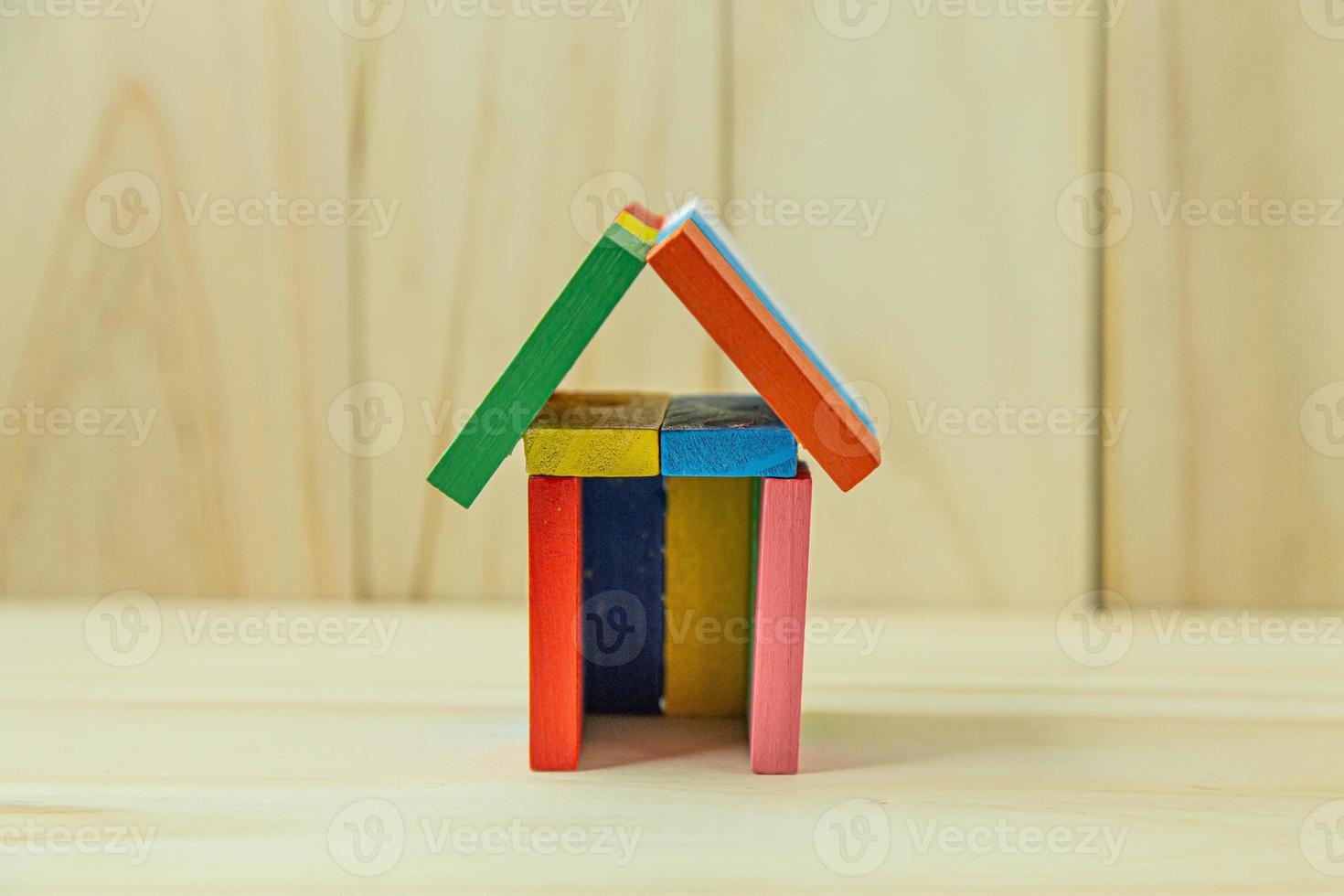 home toy on wood for property content. photo