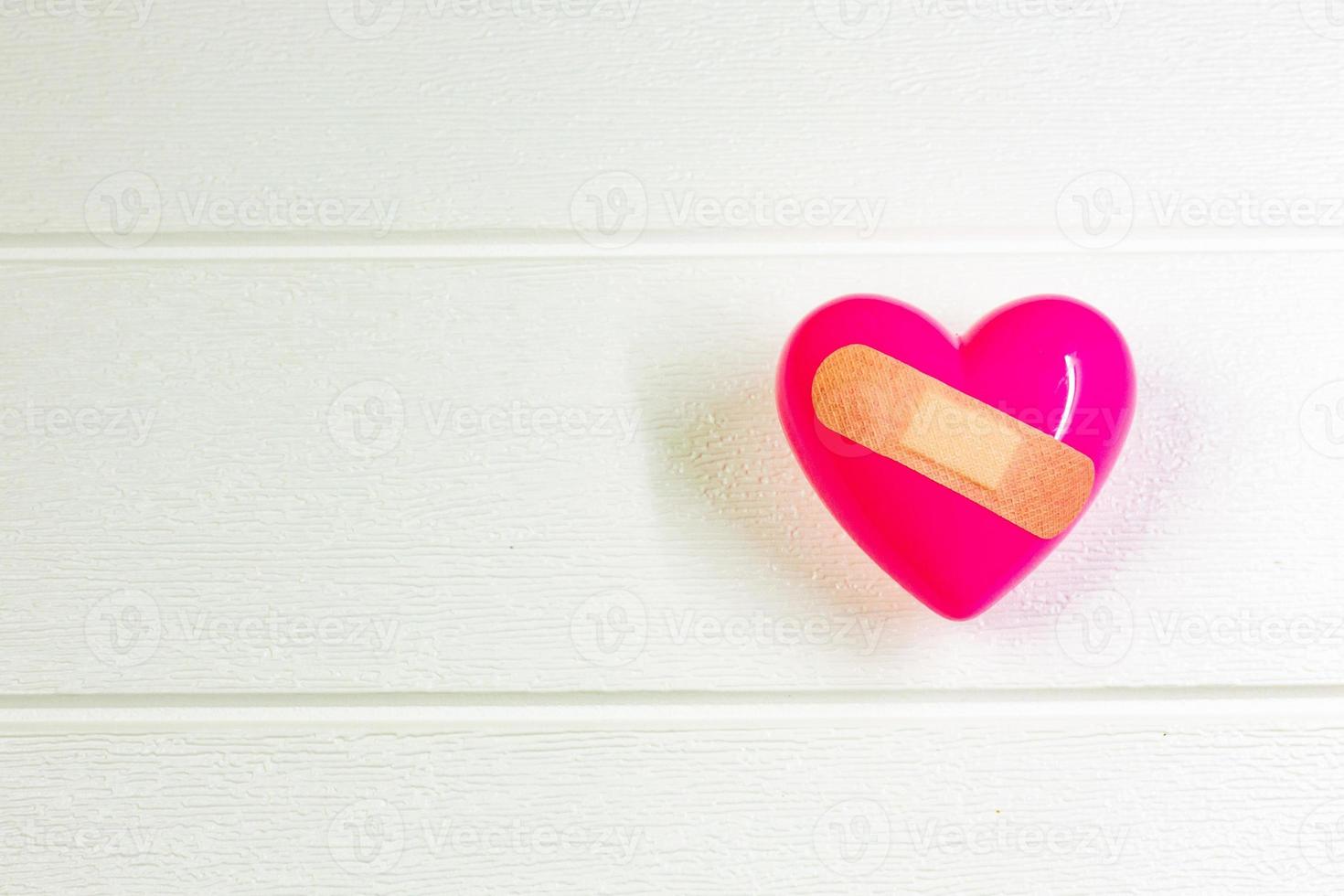 pink Heart and hand for medical content. photo